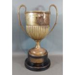 A Victorian silver trophy cup of half lobed form, 33ozs, 33cms tall