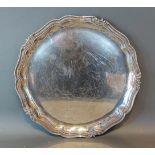 A 925 Sterling silver salver of shaped outline, 22ozs, 32cms diameter