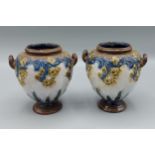 A pair of Doulton Lambeth stoneware vases, 11.5cms tall