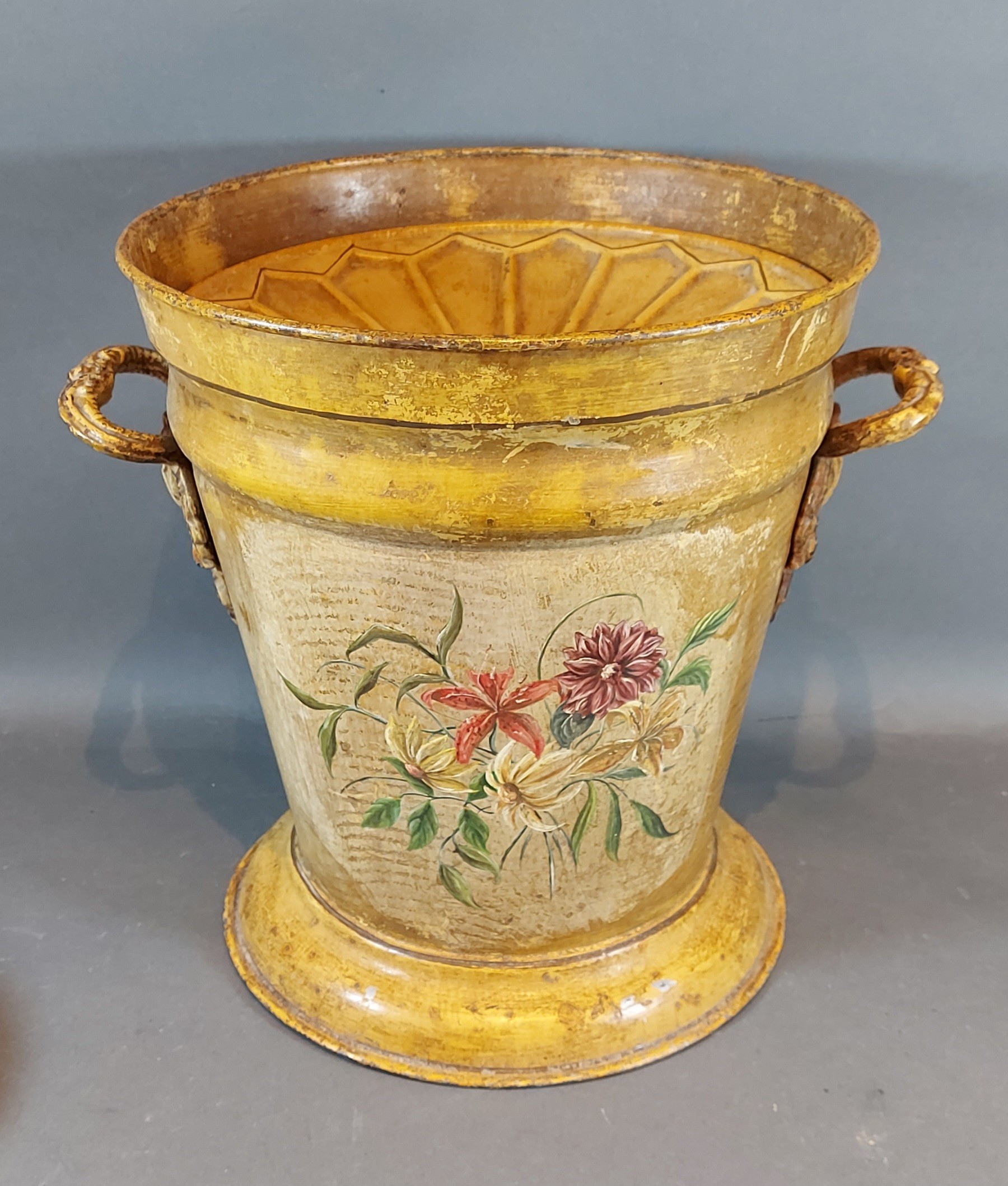 A toleware two handled lidded bucket with foliate decoration, 33cm tall