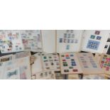 A stamp collection within albums and loose containing stamps of the world mint and used