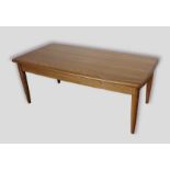 An Ercol coffee table of rectangular form, 102cms x 52cms and 40cms tall