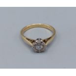 An 18ct gold solitaire diamond ring, ring size L, 2.6gms