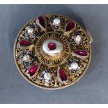 A Mother Of Pearl, Amethyst set and enamel decorated buckle of circular form, 6.5cms diameter
