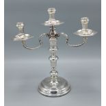 A London silver three branch candleabra in the 18th Century style, 28cms tall