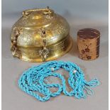 An Indian brass pandan box together with a Japanese cylindrical box and a bead necklace