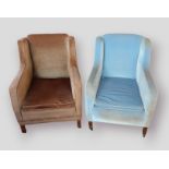 A near pair of upholstered arm chairs raised upon low square legs