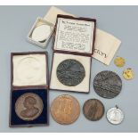 A 1902 Edward VII bronze coronation medal together with a commemorative bronze medal for George