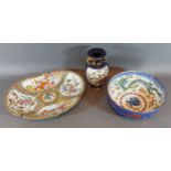 A Chinese Canton famille Rose dish decorated in polychrome enamels, together with a Chinese bowl and