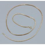 An 18ct gold neck chain, 9.5gms, 61cms long