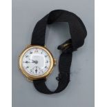 An 18ct gold wristwatch by Zenith with Swiss movement and material strap, 17.8gms including movement