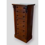 A 19th Century mahogany Wellington chest, with seven drawers and side locking mechanism raised
