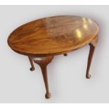 A Victorian walnut and inlaid oval centre table together with a set of six dining chairs