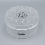 A Lalique glass cylindrical box, the cover in the form of a flower head, 11.5cms diameter