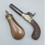 A 19th Century percussion pocket pistol, 16.5cms long together with a copper shot flask