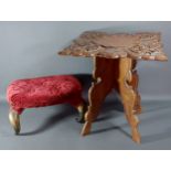 A small foot stool with horn legs together with a carved hardwood occasional table