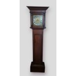 A country oak longcase clock, the square hood above a rectangular door and conforming plinth base,