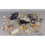 A collection of jewellery to include Jet, brooches and other jewellery