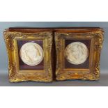 A pair of late 20th Century marble plaques within gilded frames, 39cms x 34cms