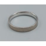 An 18ct white gold wedding band, size T, 4.3gms