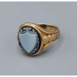 A 19th Century gold ring, set with a cameo shield