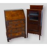 A Circa 1920's Queen Anne style bureau together with an Edwardian mahogany music cabinet