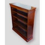 A Victorian mahogany dwarf bookcase with open shelves above a plinth, 104cms wide, 34.5cms deep