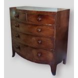 A Victorian mahogany bow fronted chest of drawers, with two short and three long drawers raised upon