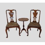 A pair of Circa 1920's walnut side chairs together with a wine table