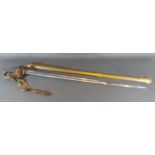 A Victorian officers sword with brass hilt and scabbard, blade length 81cms long
