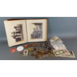 A small coin and bank note collection together with two bronze medallions and other items