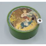 A French cylindrical music box with winding handle, 8cms diameter
