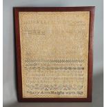 A William IV woolwork sampler, dated 1828, 38cms x 29.5cms