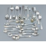 A collection of silver flatware to include teaspoons, pickle forks and a butter knife, 15ozs