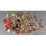 A collection of jewellery to include necklaces, bracelets, ear clips and other items of jewellery