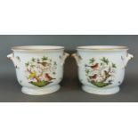 A pair of Herend porcelain large jardinier, hand painted with birds amongst foliage, 24.5cms