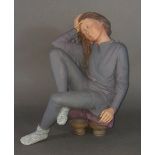 A model of a seated girl by Elisa, limited edition, 23cms tall