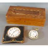 An 8 day travel clock within leather case, together with a goliath pocket watch and an inlaid