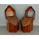 A near pair of Regency knife boxes of serpentine form, each with a star inlaid hinged top