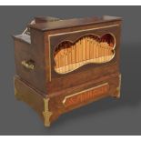 Arthur Prinsen, a crank organ playing cardboard music books, complete with twenty five books,