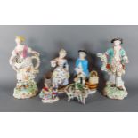 A pair of German porcelain figures, decorated with polychrome enamels and highlighted with gilt,