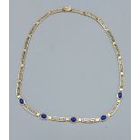 A 14ct gold linked necklace set with five Lapis Lazuli, 16.5gms, 45cms long