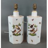 A pair of Herend porcelain table lamps of hexagonal form, handpainted with birds amongst foliage,