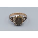 A Victorian 9ct gold pearl and enamel mourning ring, ring size L, 2gms
