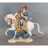 Professor Theodor Karner, a Rosenthal porcelain model of of a military horse and rider, 32cms tall