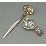 A Danish sterling silver sauce ladle by Georg Jensen with Cactus decoration, 15cms long, together