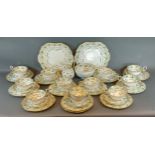 A 19th Century English porcelain tea service comprising cups, saucers and plates