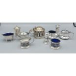 A William IV silver mustard together with two sets of three silver condiments and two silver