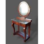 A 19th Century French Empire style dressing table, the circular mirror above a variegated marble top