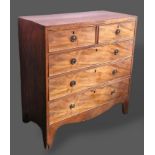 A 19th Century mahogany chest of two short and three long drawers with circular handles raised